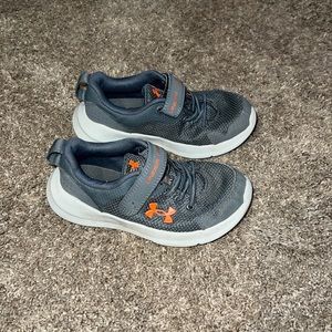 Boys UA toddler size 11 shoes.